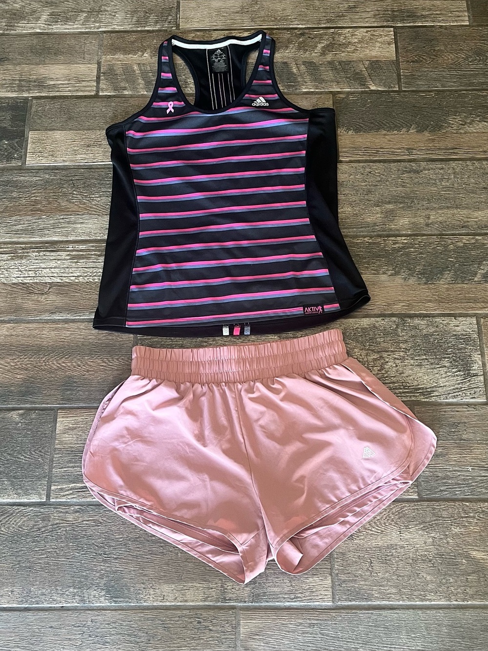 Haimont athletic shorts with built in lining M  Adidas Against Cancer tank top L